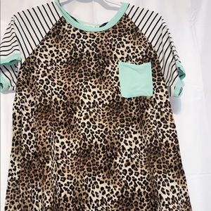 Cute cheetah with teal and stripes top!